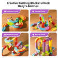 Colorful building block track set with various configurations on a wooden surface.